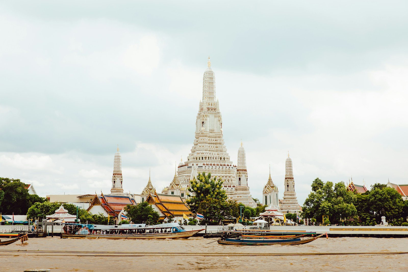 Wat Arun temple beside the Chao Phraya River in Bangkok.